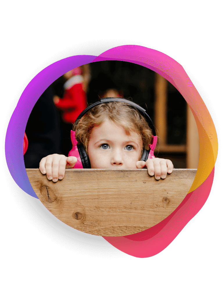 child wearing a now press play headset