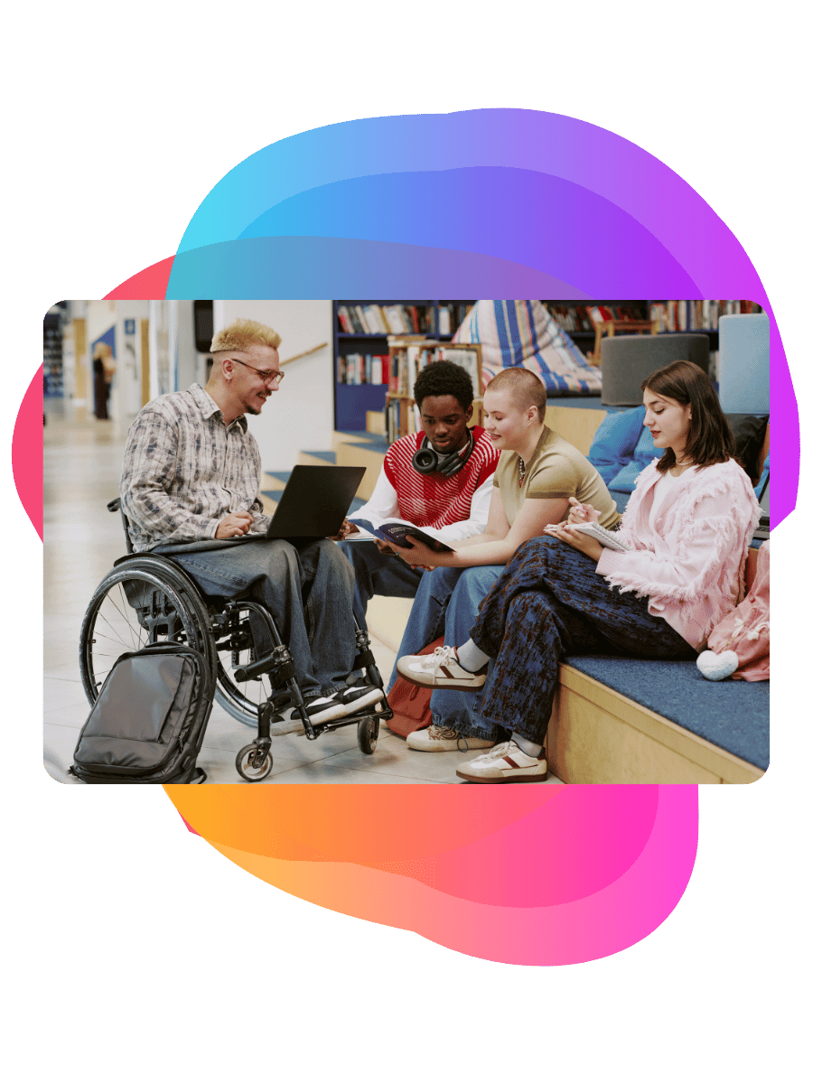 A group of students with a tutor who is in a wheelchair - Bee Digital marketing agency