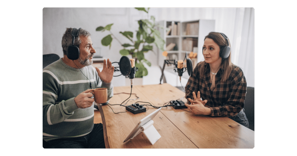 Photo of two Podcasters in discussion - Bee Digital marketing agency