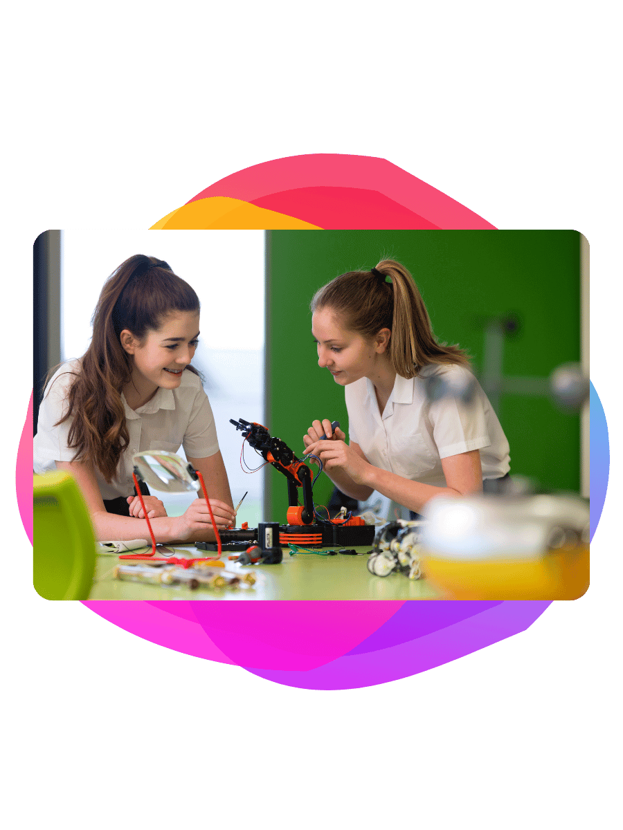 Two girls experimenting a school science lab - Bee Digital marketing agency